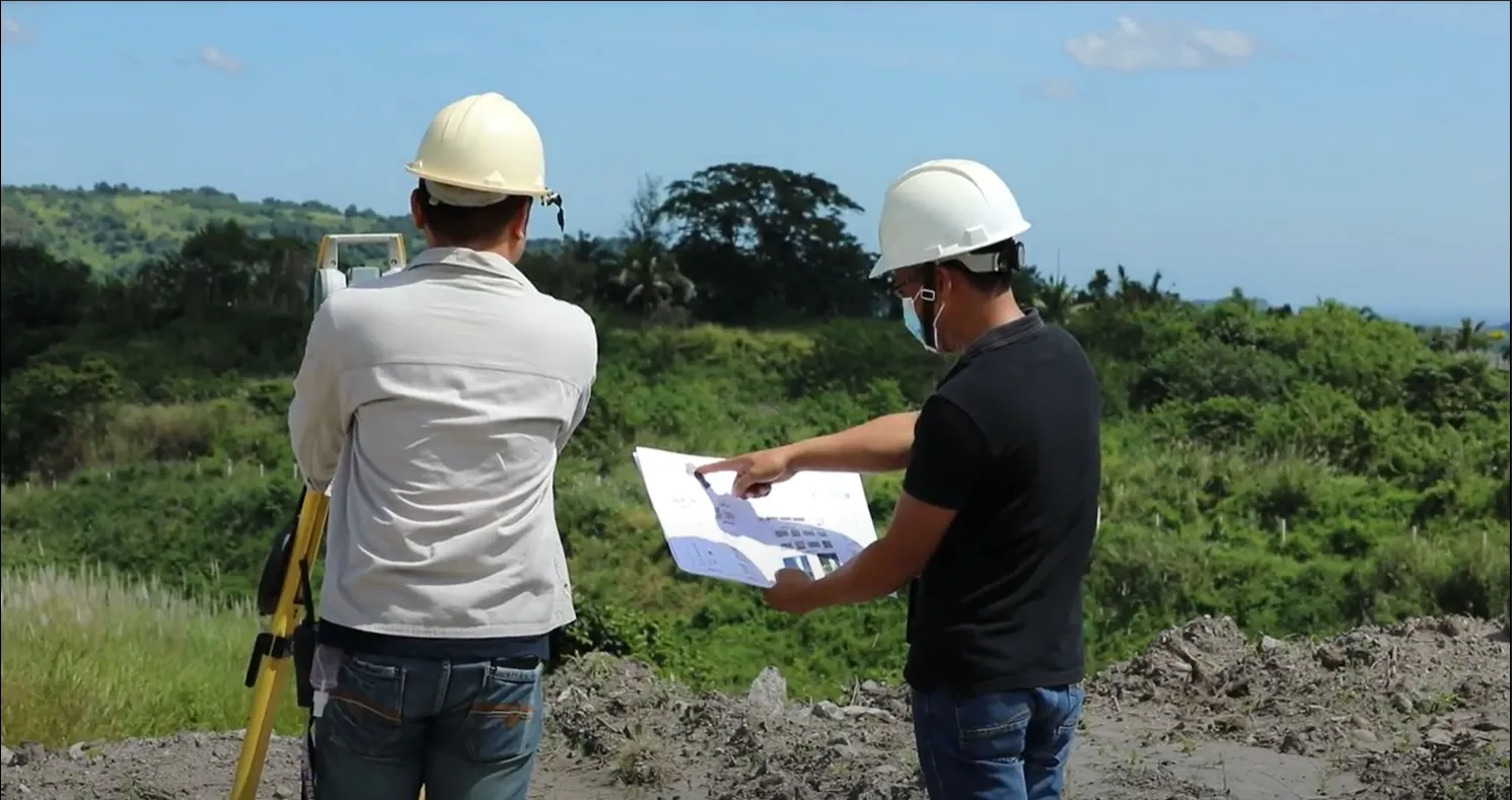 FLDCC engineers reviewing project plans on site